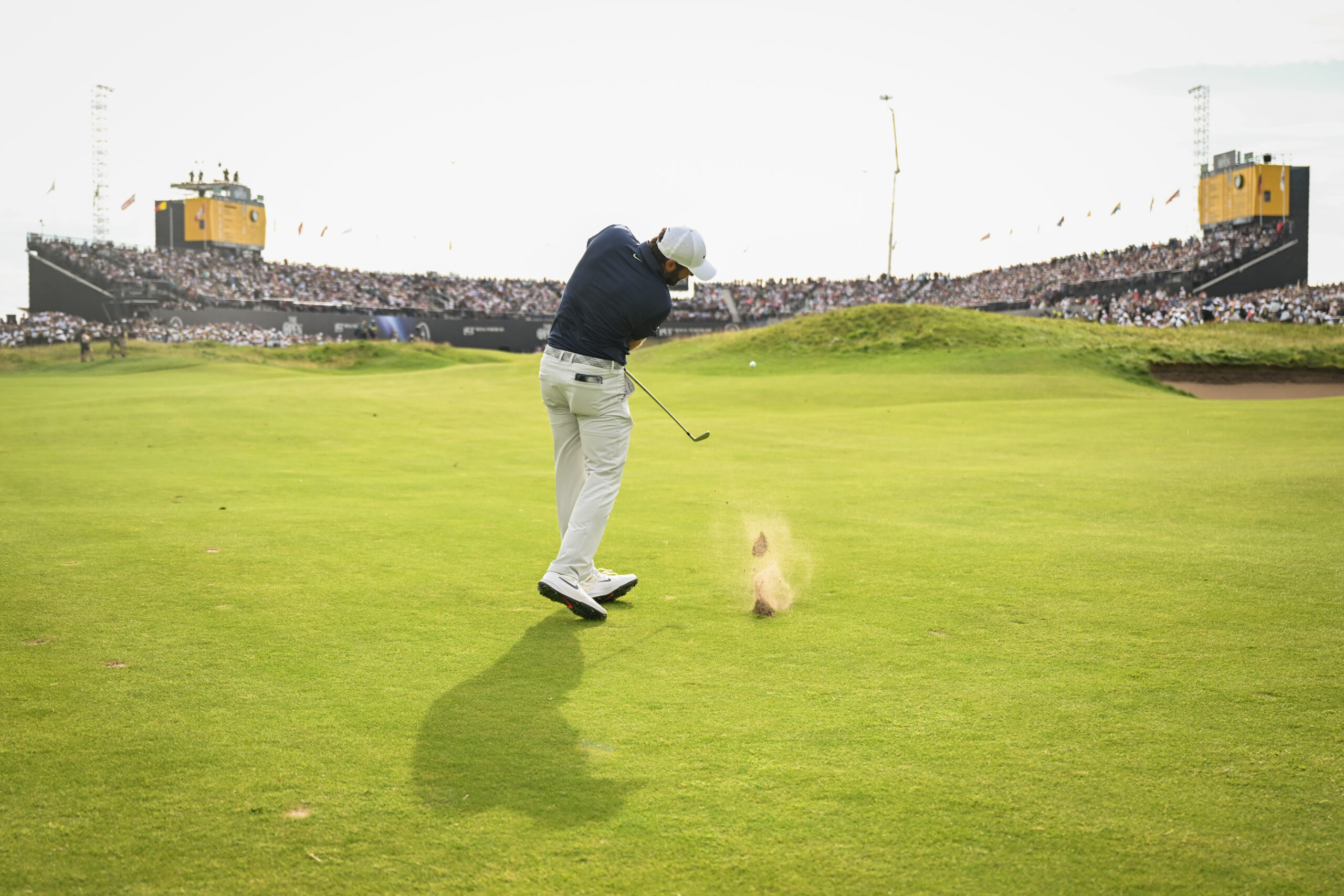 PORTRUSH, NORTHERN IRELAND - JULY 20: Scottie Scheffler of The United States plays his second shot on the 18th on day four of The 153rd Open Championship at Royal Portrush Golf Club on July 20, 2025 in Portrush, Northern Ireland. (Photo by Alex Pantling/R&A/R&A via Getty Images)